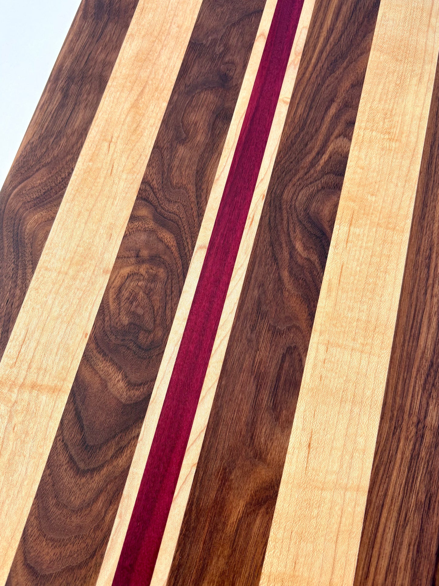 Ready to ship - Walnut, maple and purple heart cutting board