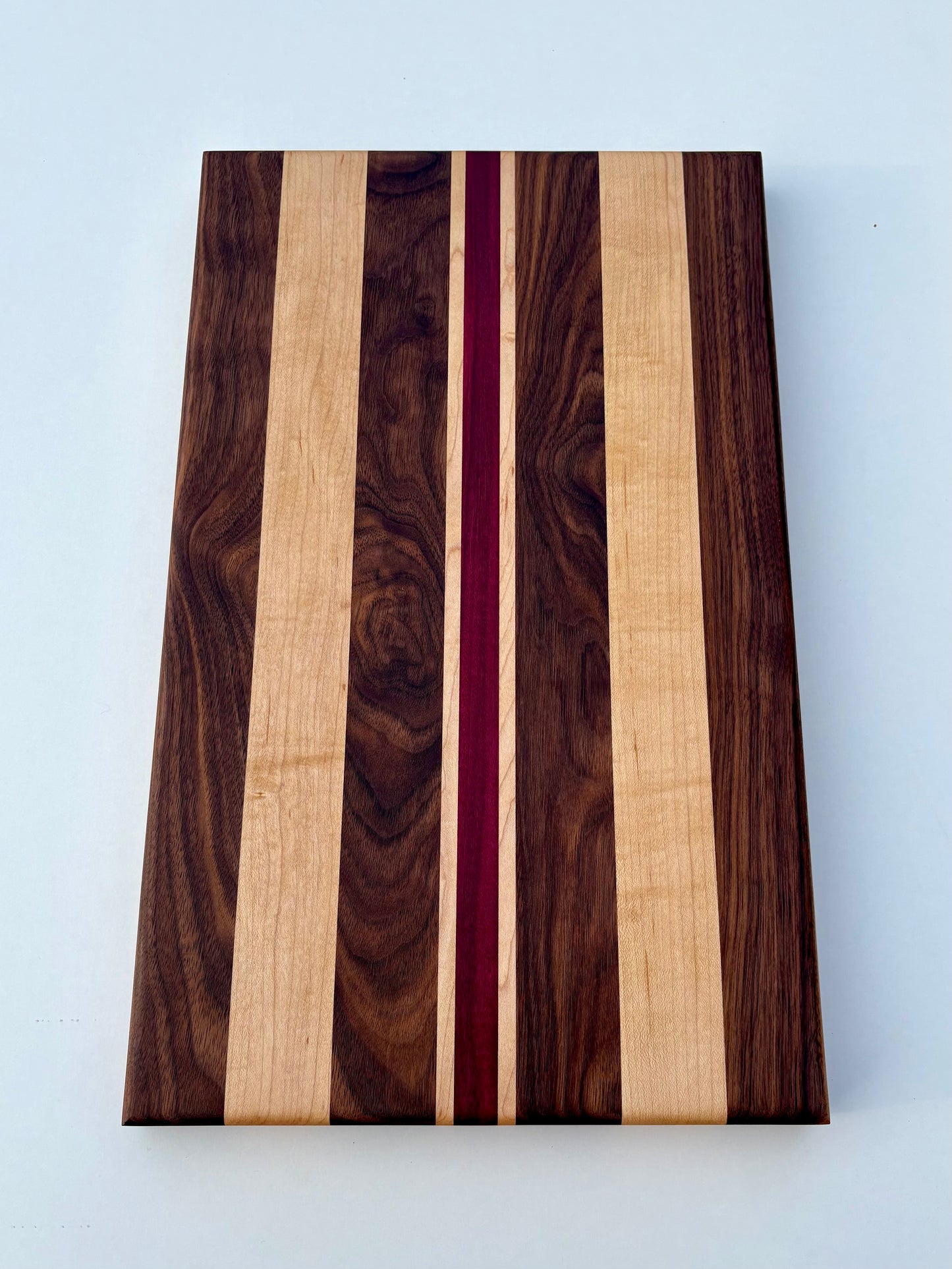 Ready to ship - Walnut, maple and purple heart cutting board