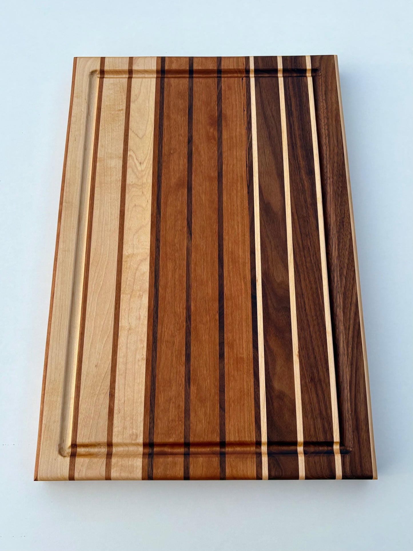 Ready to ship - Walnut, maple and cherry cutting board