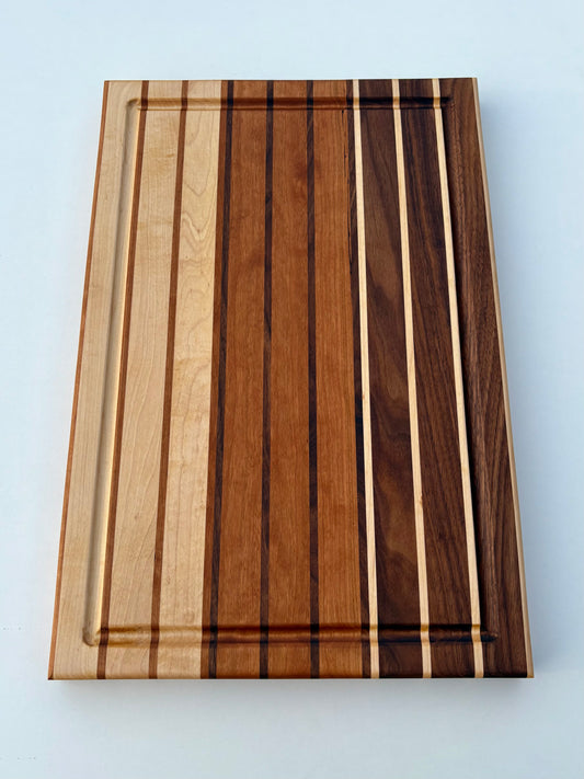 Ready to ship - Walnut, maple and cherry cutting board