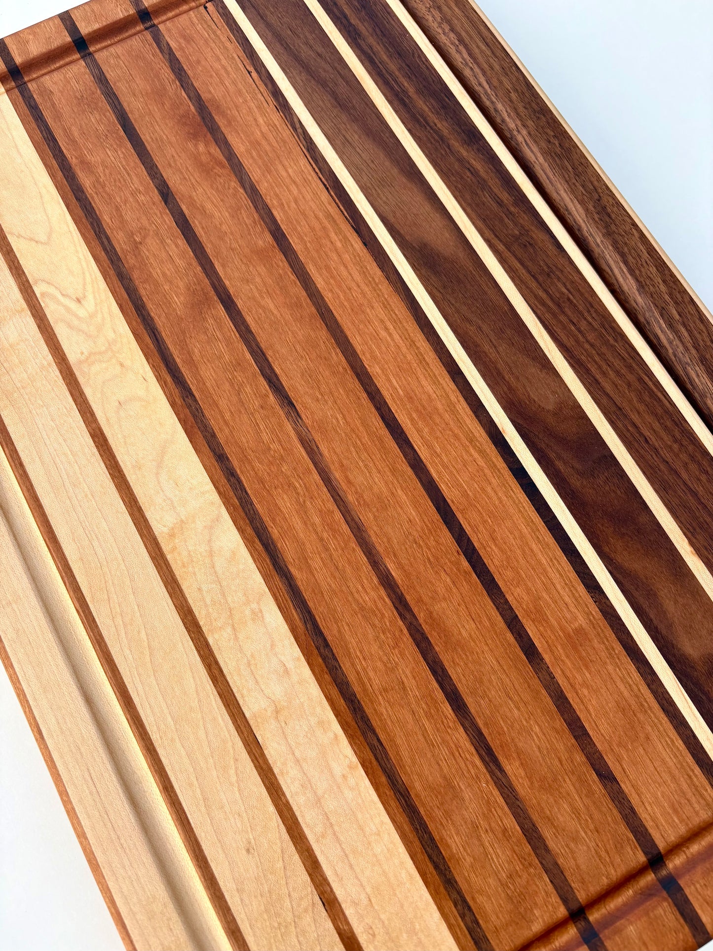 Ready to ship - Walnut, maple and cherry cutting board