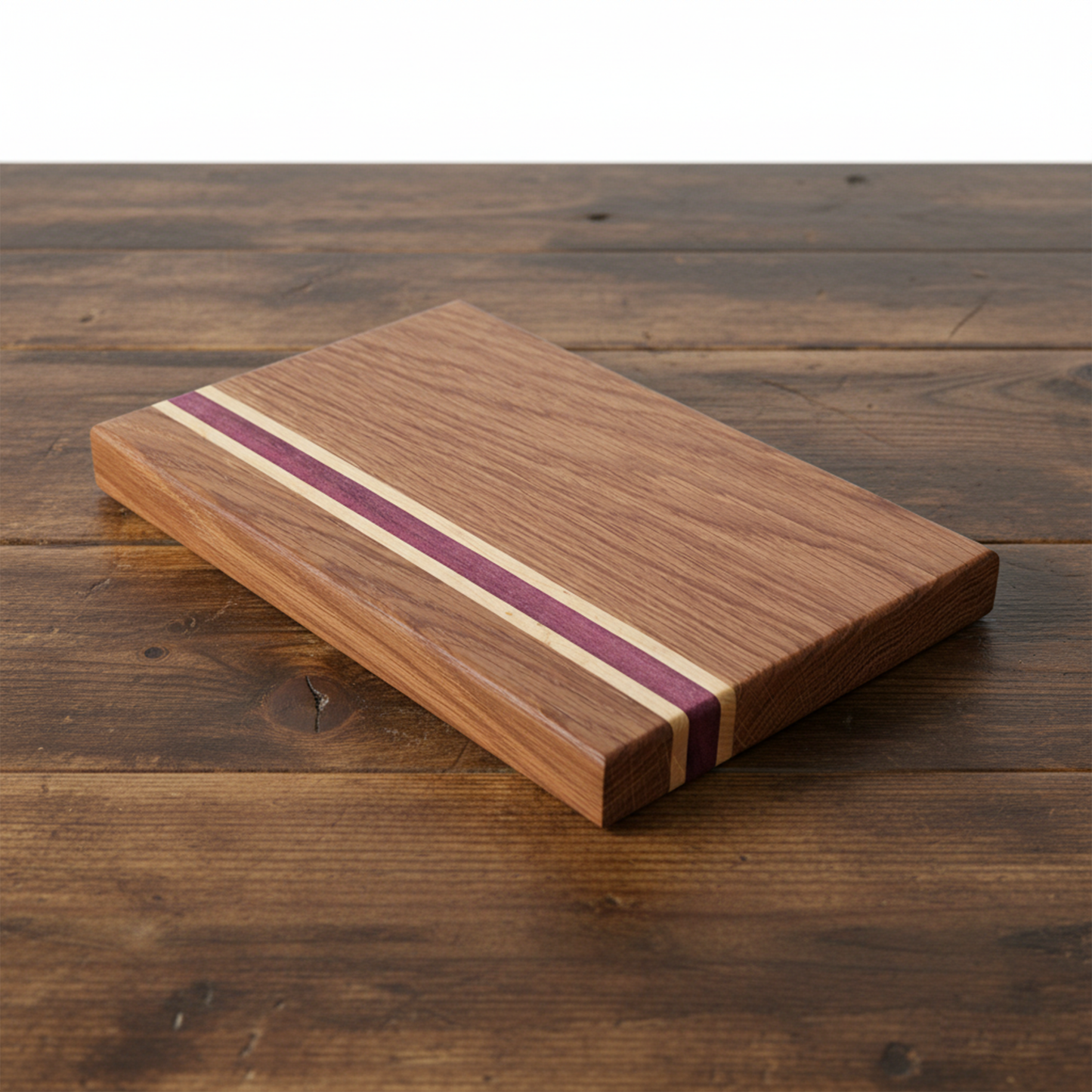 White oak, maple and purple heart edge grain board